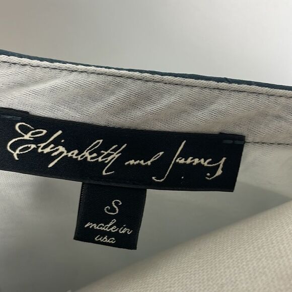 Elizabeth and James White with Gray Sheet Overlay Top - Picture 5 of 6